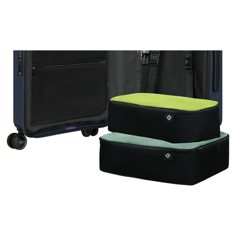 Samsonite Restackd packing cube set beside the case