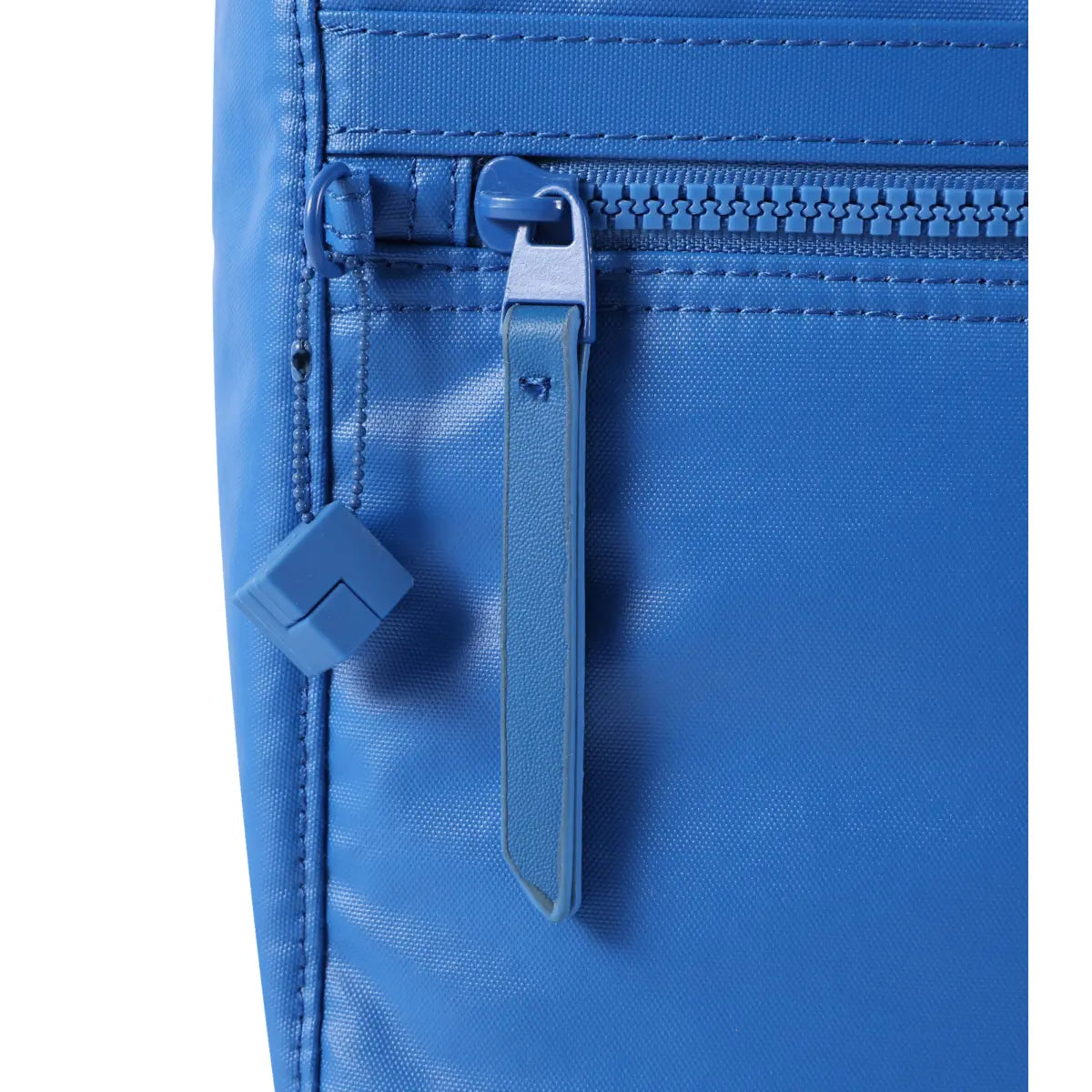 Adorned with a decorative cube and tone-on-tone hardware