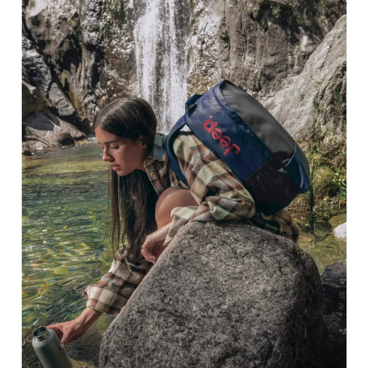 The Jeep JS012C Dual Material Backpack, crafted from recycled water-repellent polyester for rugged durability