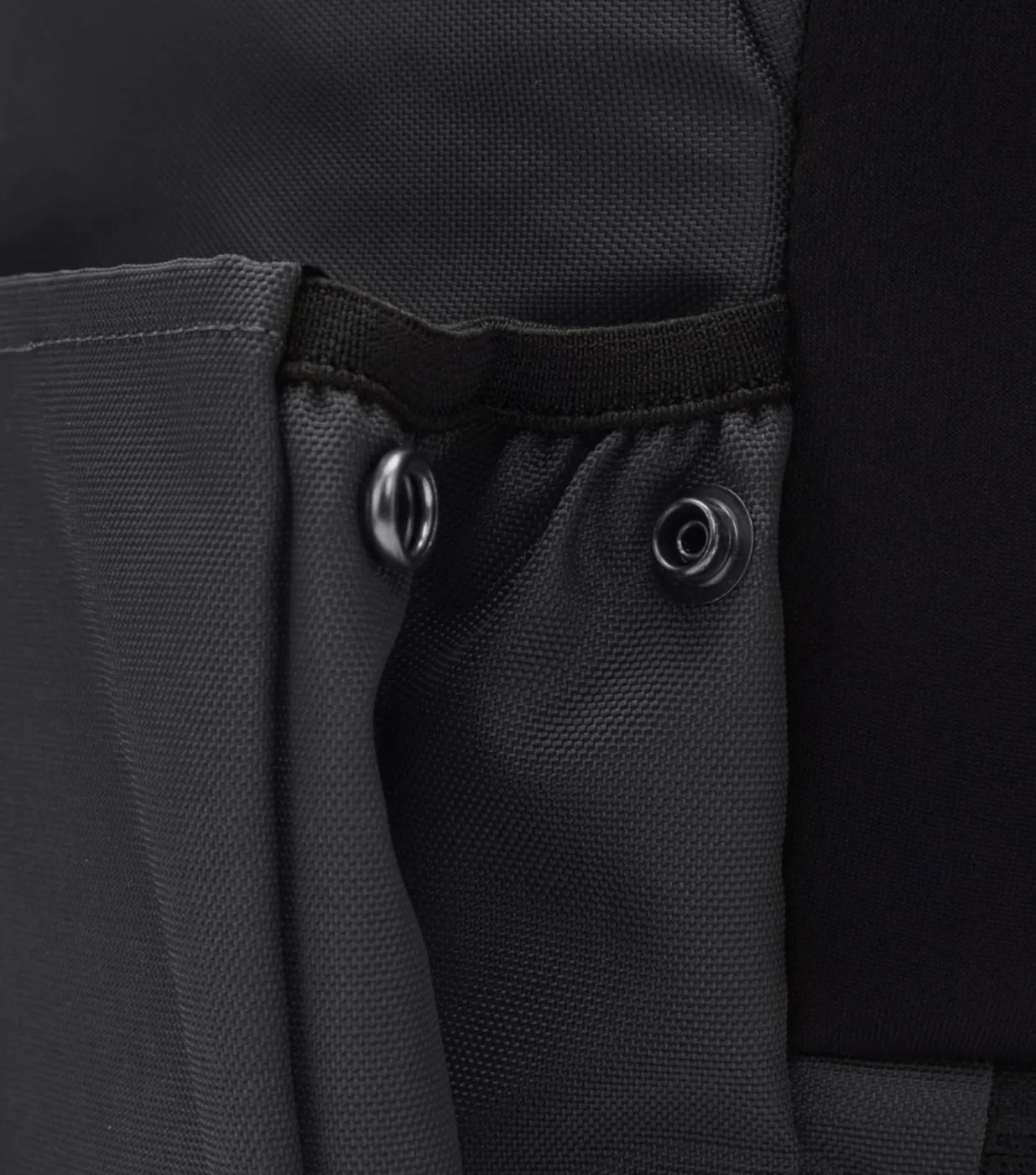 Side pocket(s) for quick access to a reusable water bottle or small umbrella
