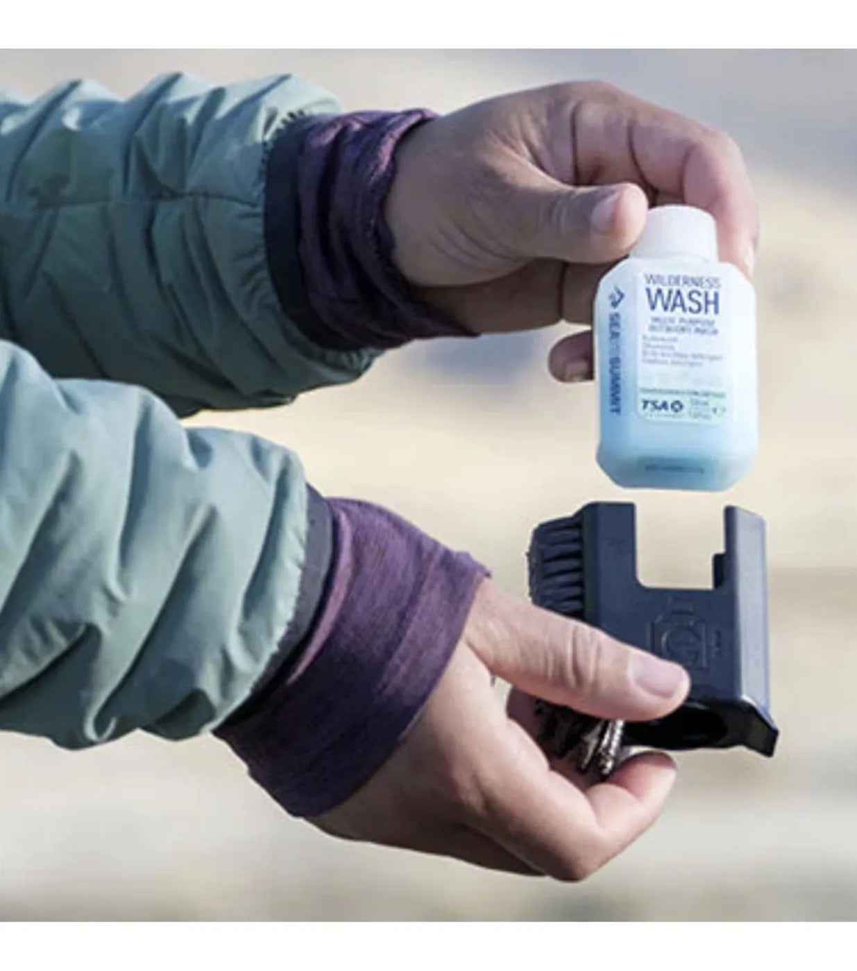 Pocket-sized convenience: Pot Scrubber and integrated 50ml bottle of Wilderness Wash fit in the palm of your hand