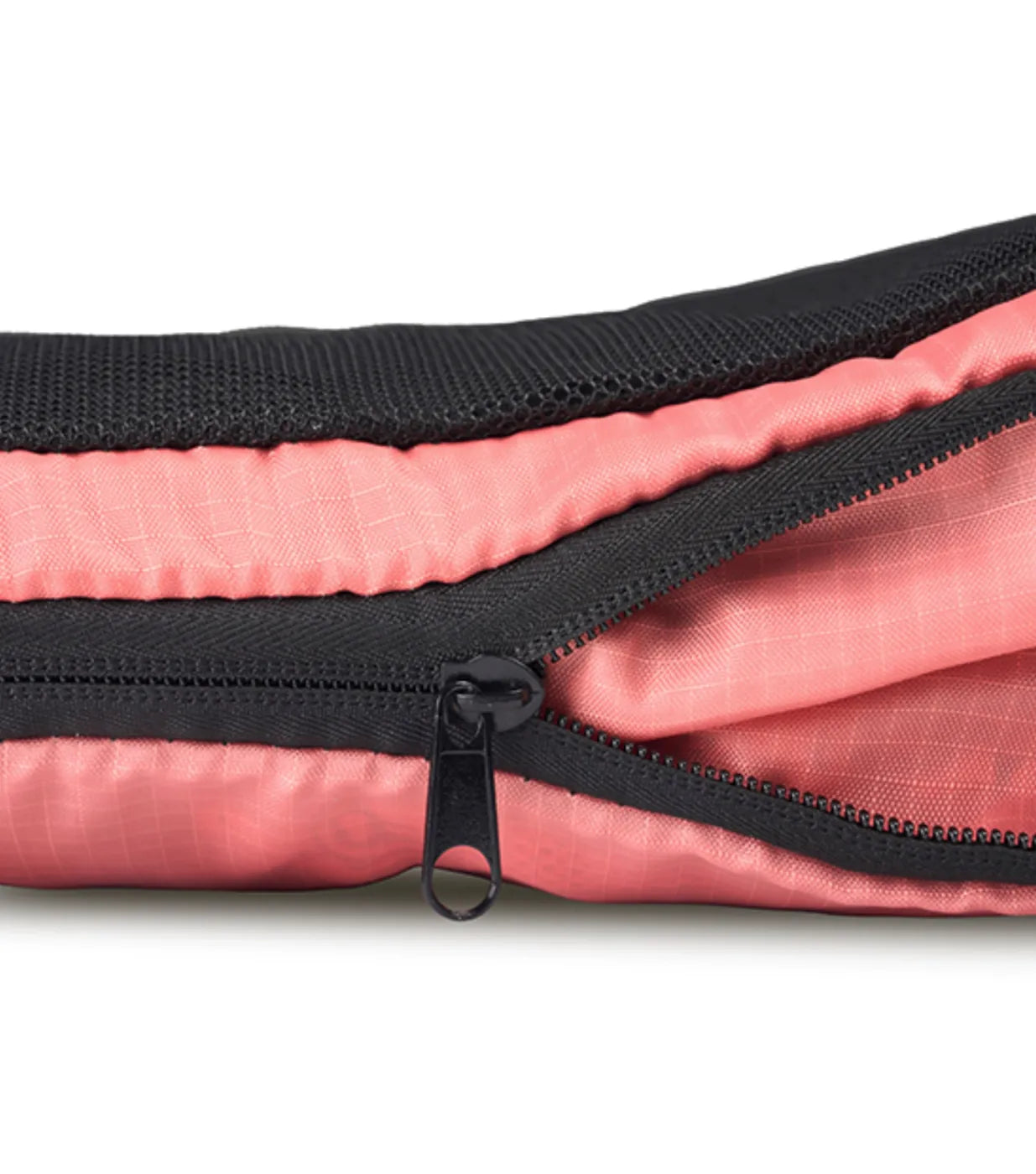 Second zipper compresses the contents of the cube