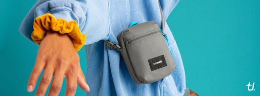 Selection of Pacsafe anti-theft hip packs, sling bags, crossbody bags and convertible backpacks for travel