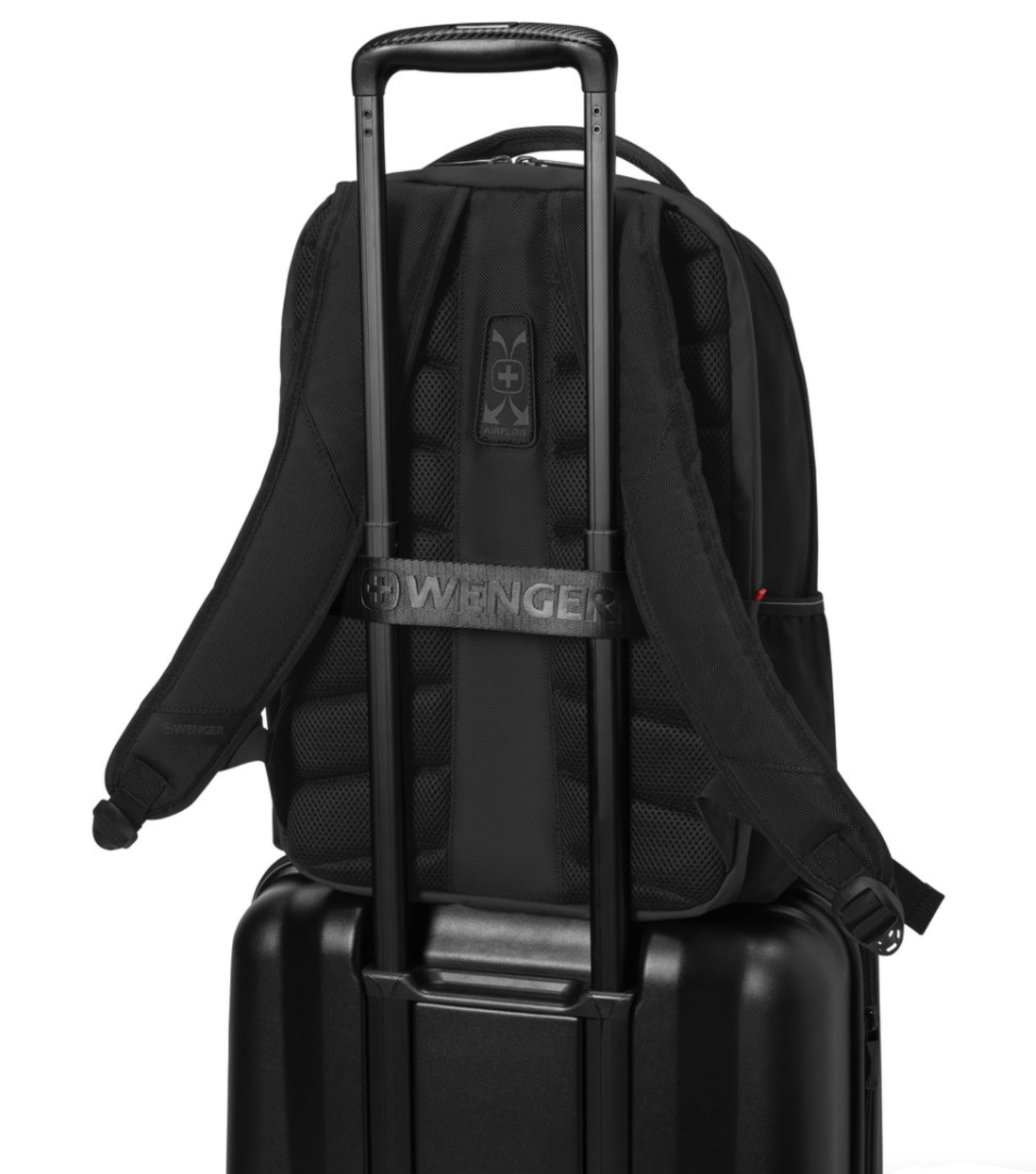 Pass-Thru trolley strap slides over wheeled luggage handles for easy travel with multiple bags