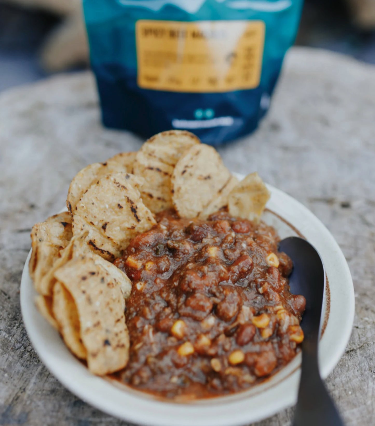 freeze dried beef mince, kidney beans, corn and tomato in a hot chilli sauce, with corn chips to dip