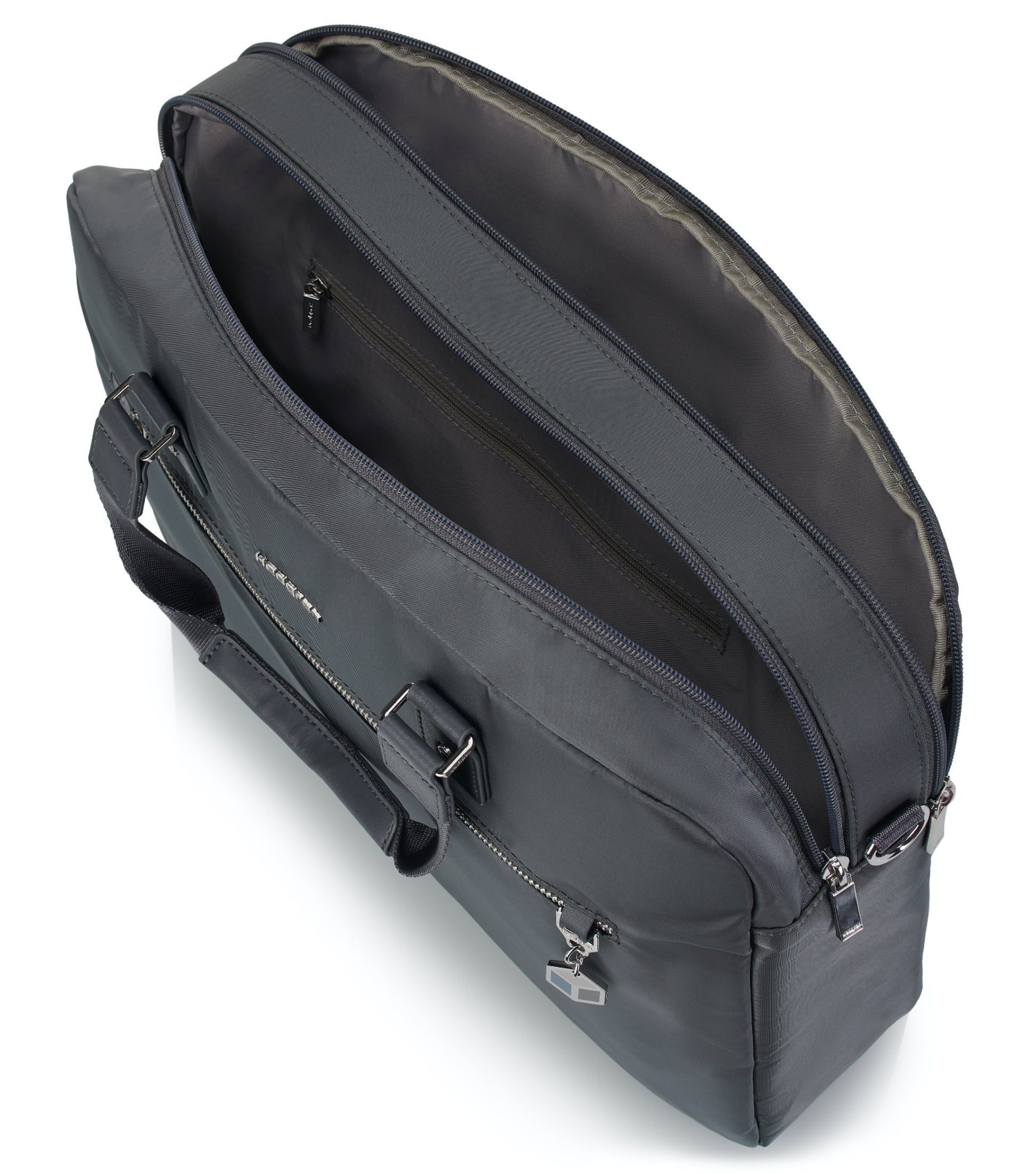 Main compartment has a zippered pocket and two open pockets