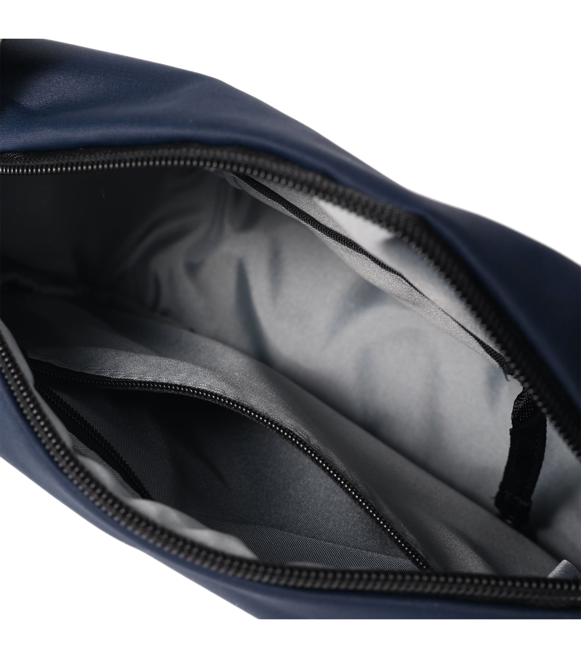 Main compartment has one open pocket and key chain inside