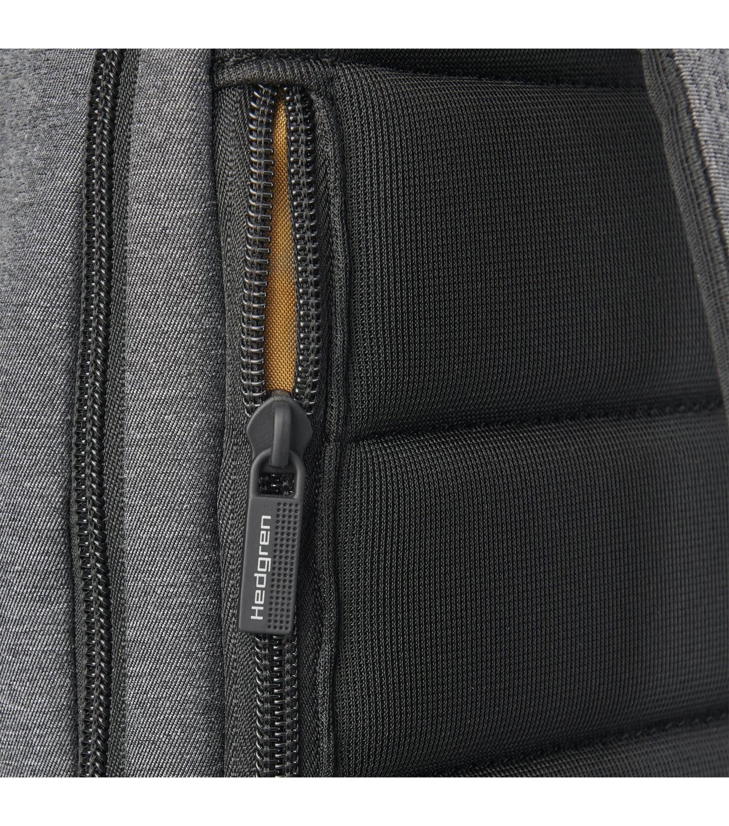 Rear quick access zip pocket