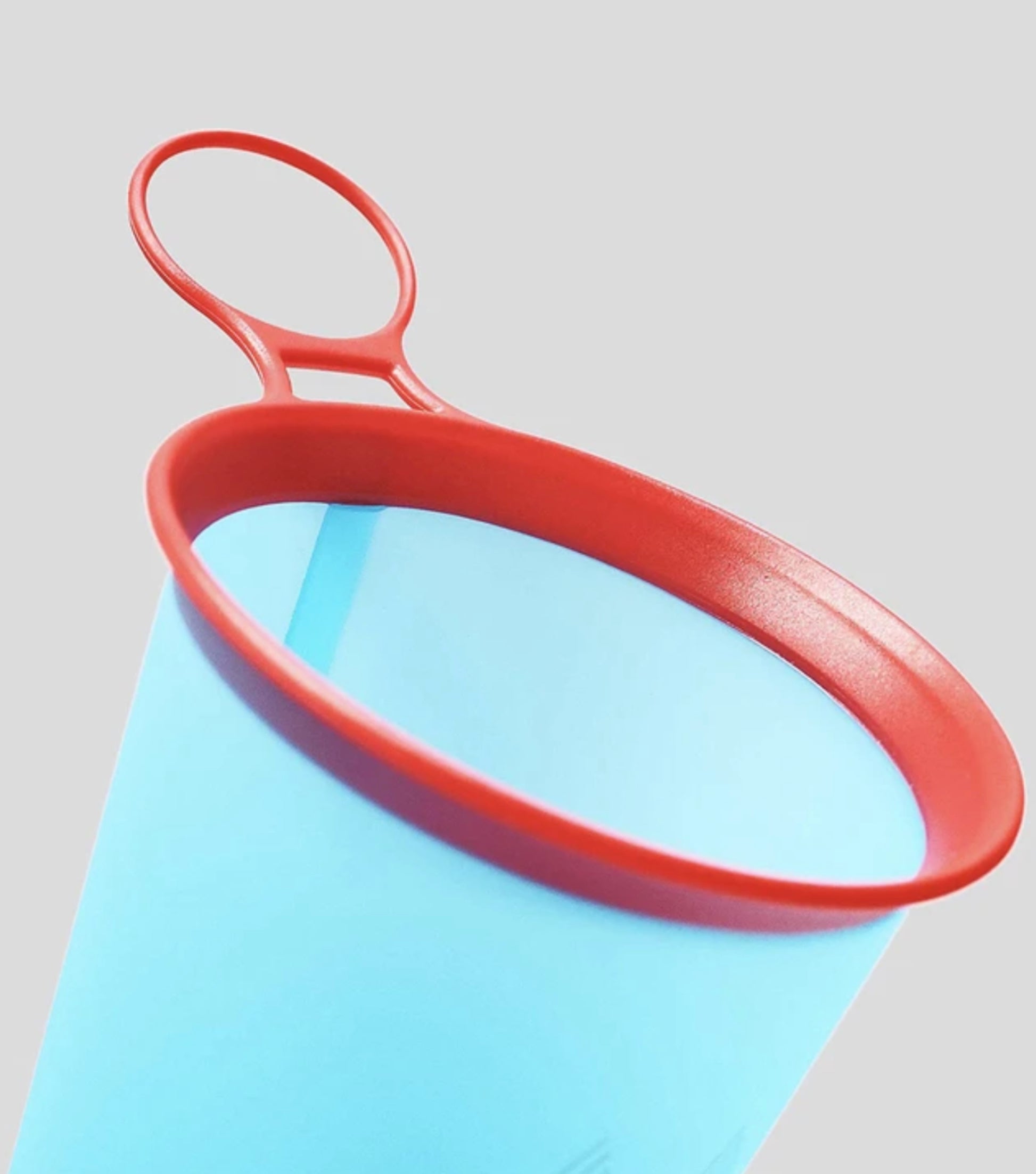 Integrated finger loop provides support when drinking or pouring, free standing when empty and full