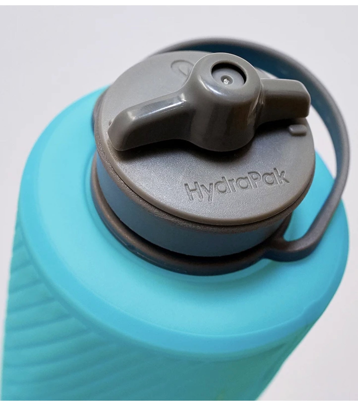 Unique drink through cap with spill-proof valve for easy drinking and no leak-usage