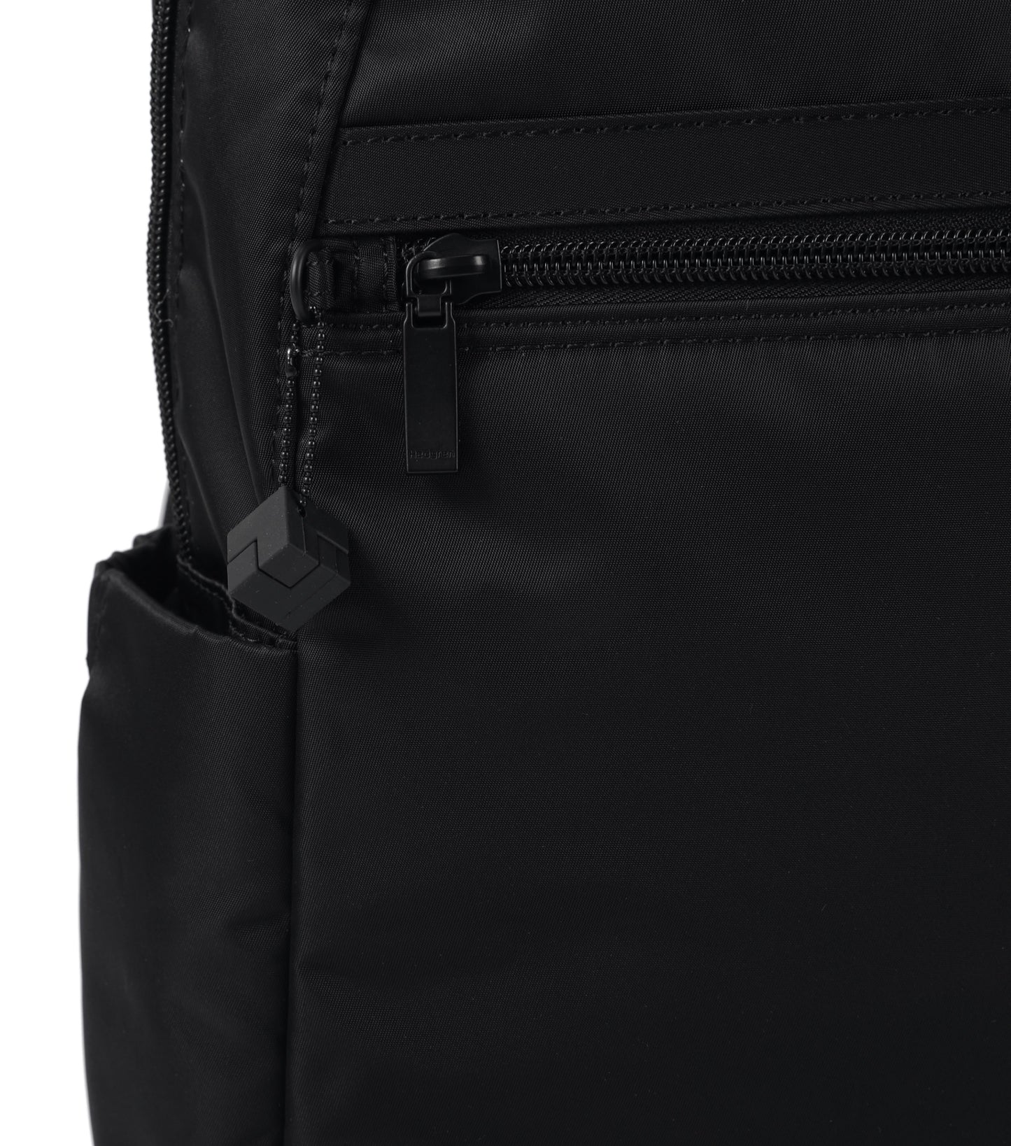 Side pockets for quick access to a reusable water bottle or small umbrella