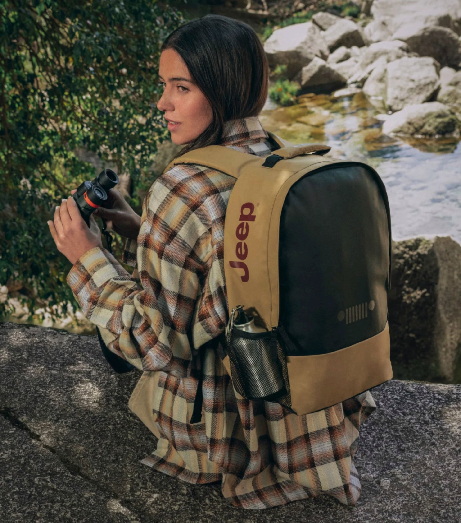 the Jeep JS012C Dual Material Backpack, crafted from recycled water-repellent polyester for rugged durability