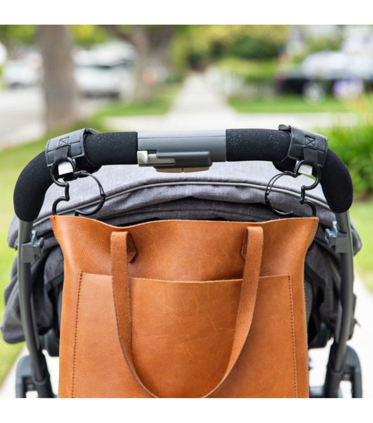 Strap on hooks to easily carry shopping bags, purses and more on your stroller