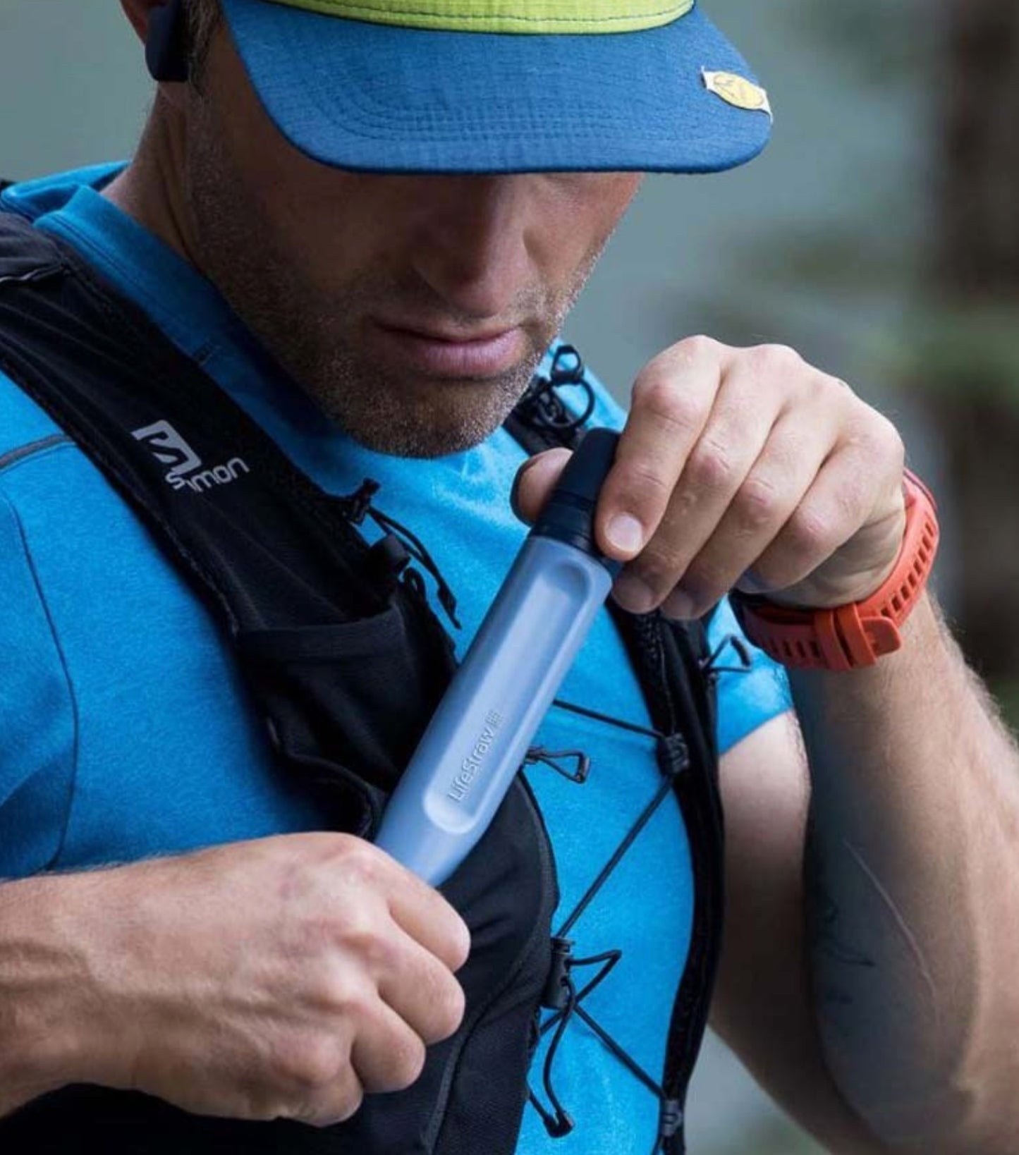 Fill a container to use your straw water filter on the go