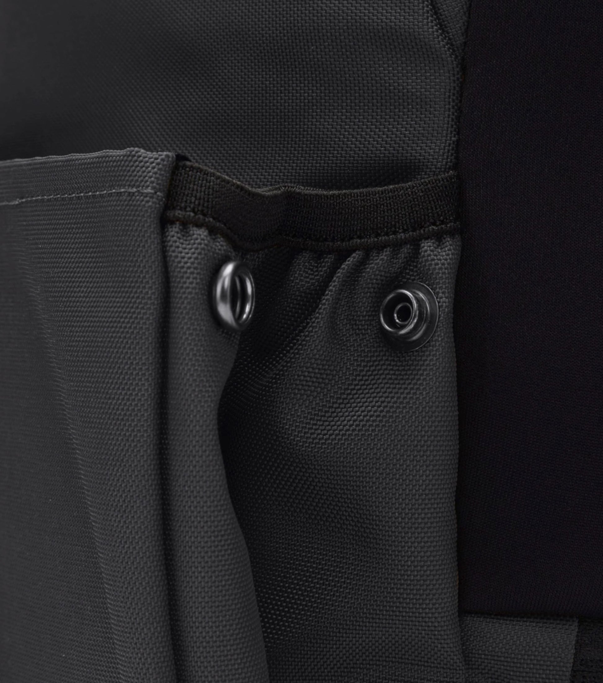 Side pocket(s) for quick access to a reusable water bottle or small umbrella