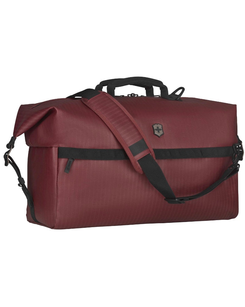 Exterior features a full length front zip pocket with storage slots and a full length rear zip pocket