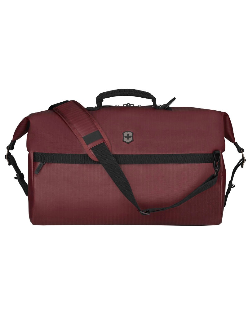 Exterior features a full length front zip pocket with storage slots and a full length rear zip pocket