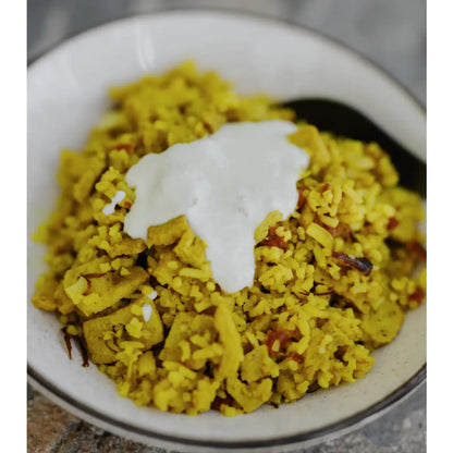 authentic spicy rice and freeze-dried chicken with vegetables, almond flakes and a yoghurt sauce to mix