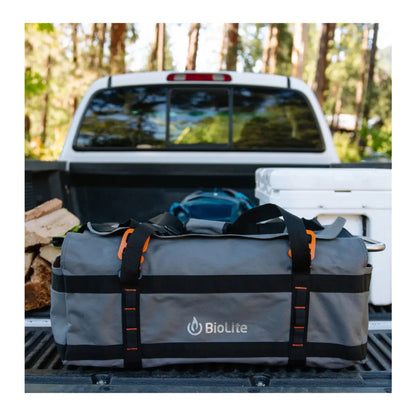 Outer pockets for kindling, matches, and other tools