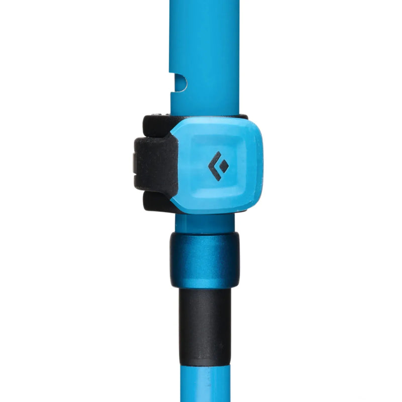 Blue black diamond distance carbon trekking pole with black grip and light blue branded collar in desert sky color
