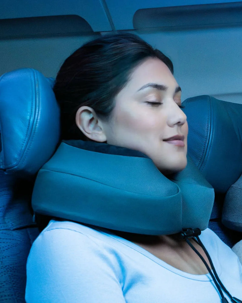 Cabeau Evolution S3 neck pillow worn while travelling