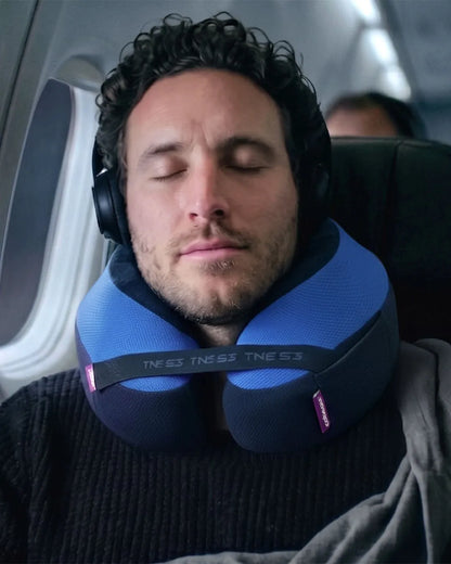 Cabeau The Neck's Evolution S3 neck pillow worn while travelling