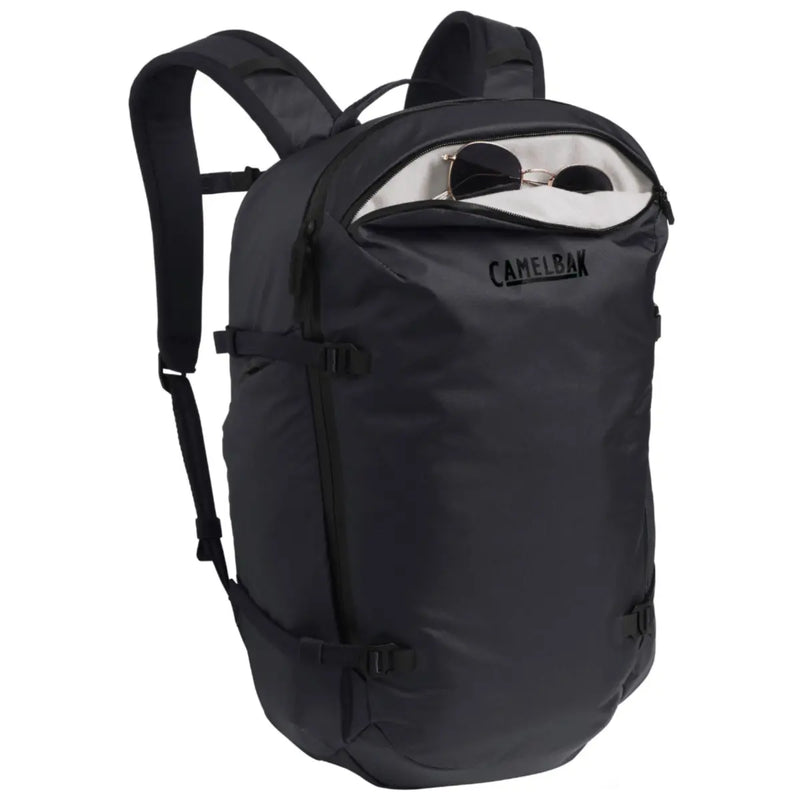 Sunglasses Pocket: A soft-lined pocket to keep your shades secure