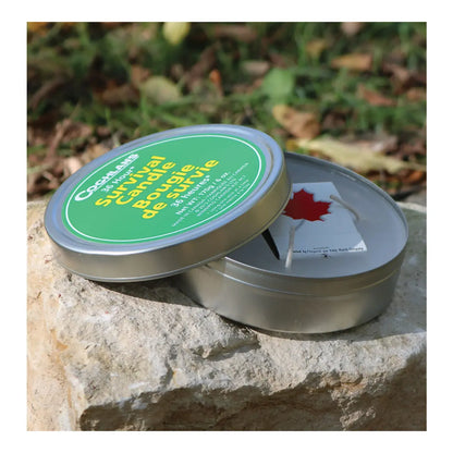 Metal canister with cover protects candle