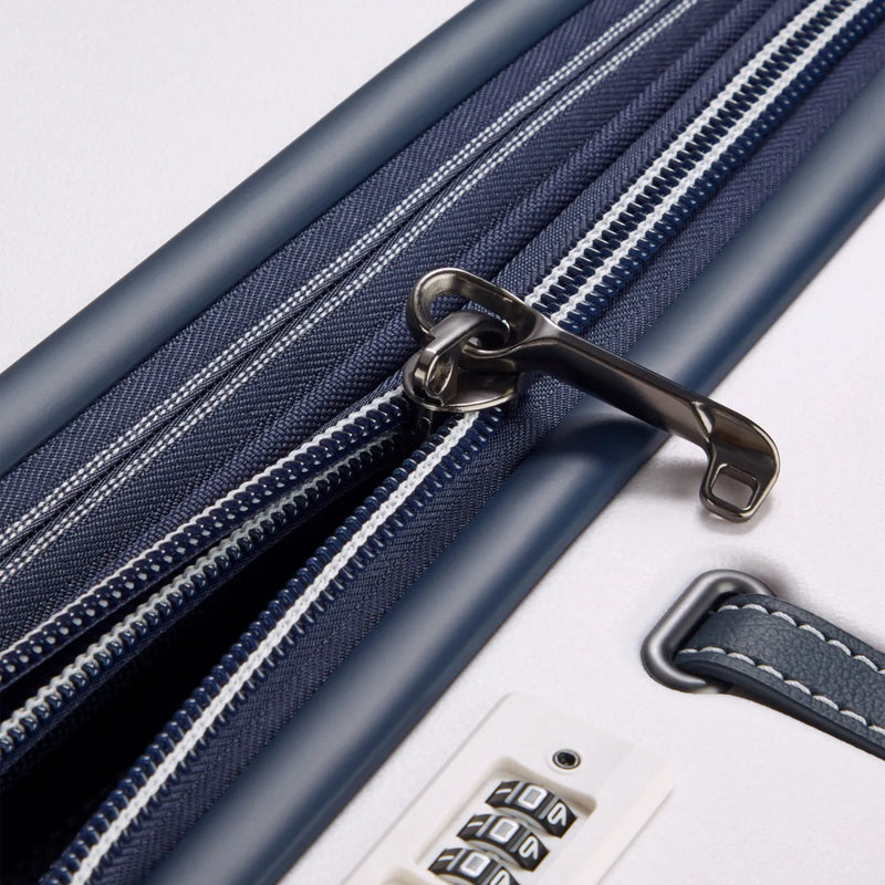 Delsey Cadence 76 cm 4-Wheel Expandable Suitcase - Ivory / Navy