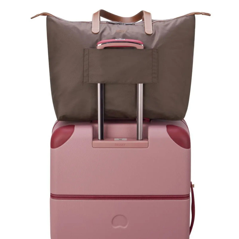 Luggage sleeve on back (luggage sold separately)