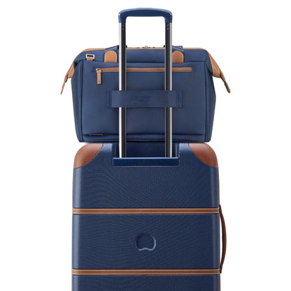 Trolley system compatible allowing the bag to slide over a suitcase handle