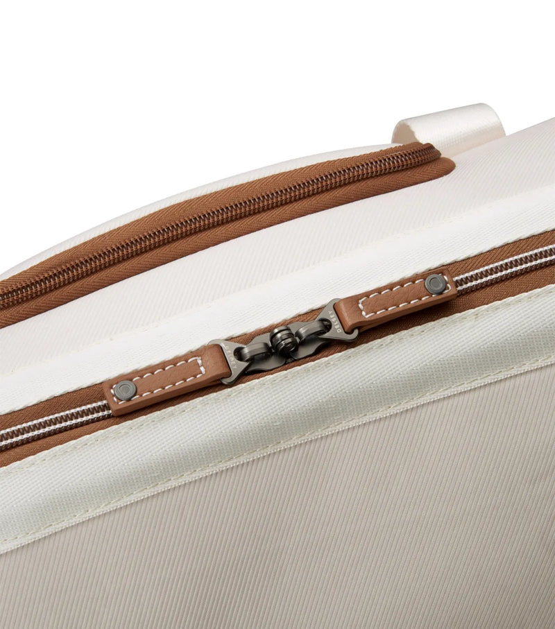 Durable, eco-friendly chevron pattern fabric made with recycled water bottles and vegan leather-trim