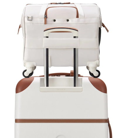 Smart band to slide over the telescopic handle of a rolling luggage (luggage not included)