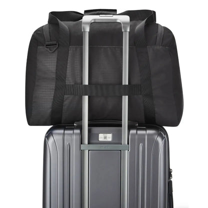 Trolley system compatible allowing the bag to slide over a suitcase handle (sold separately)