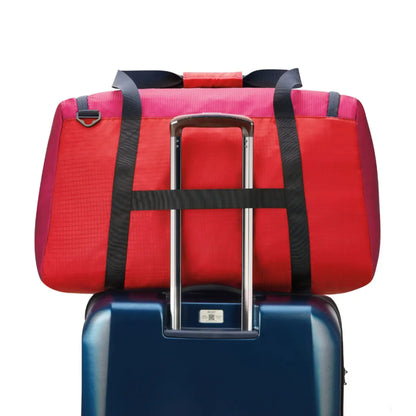 Trolley system compatible allowing the bag to slide over a suitcase handle (sold separately)