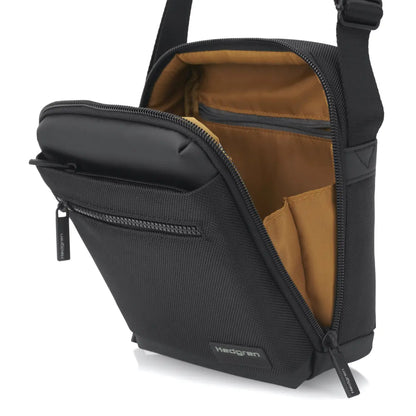 Zippered main compartment holds a small device