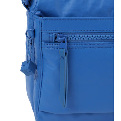 Adorned with a decorative cube and tone-on-tone hardware