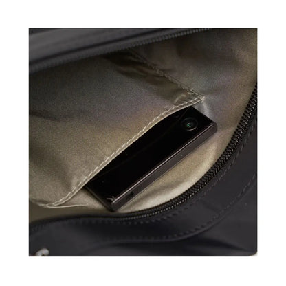 Front zippered compartment has open slip pocket