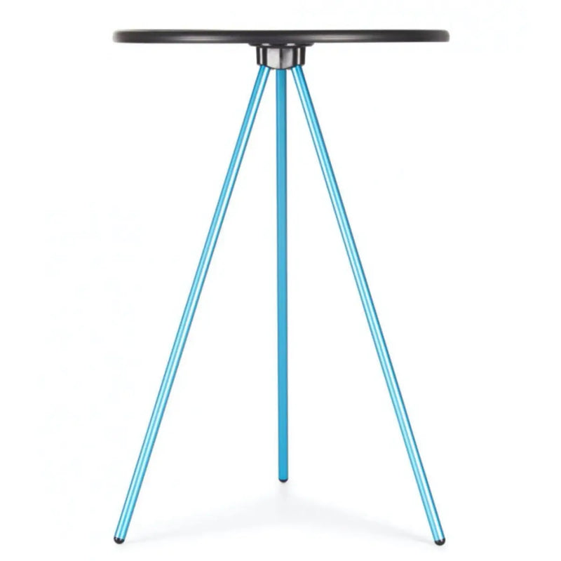 Tripod style camp table with a circular hard surface top
