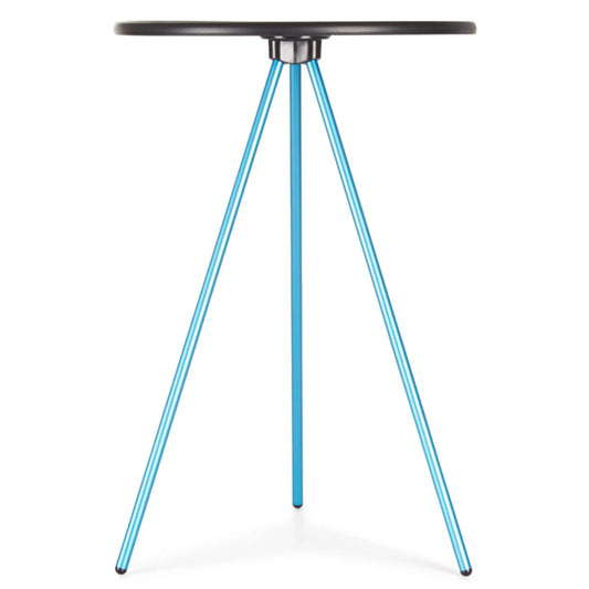 Tripod style camp table with a circular hard surface top