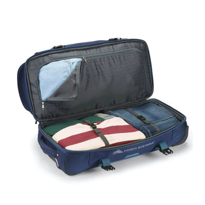 Large main compartment with zipper pass through to drop bottom