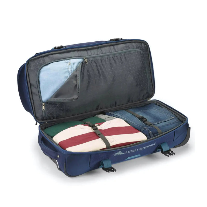 Large main compartment with zipper pass through to drop bottom