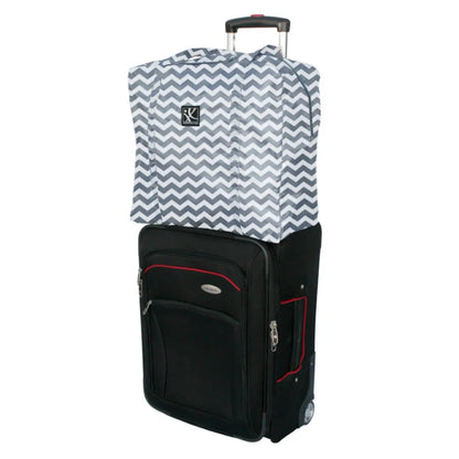 Back panel attaches to telescoping luggage handle