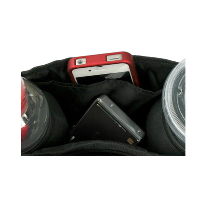 Easy-access center compartment is large enough to hold toys, sippy cup, sunglasses, wallet and more