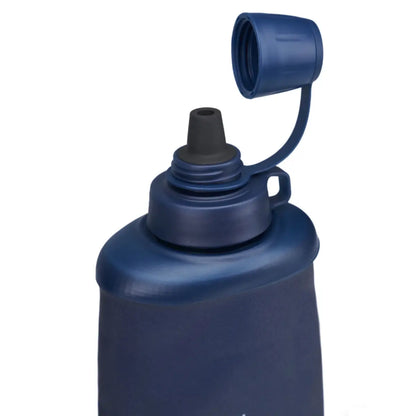 Collapsible squeeze bottle with screw-top cap and tether