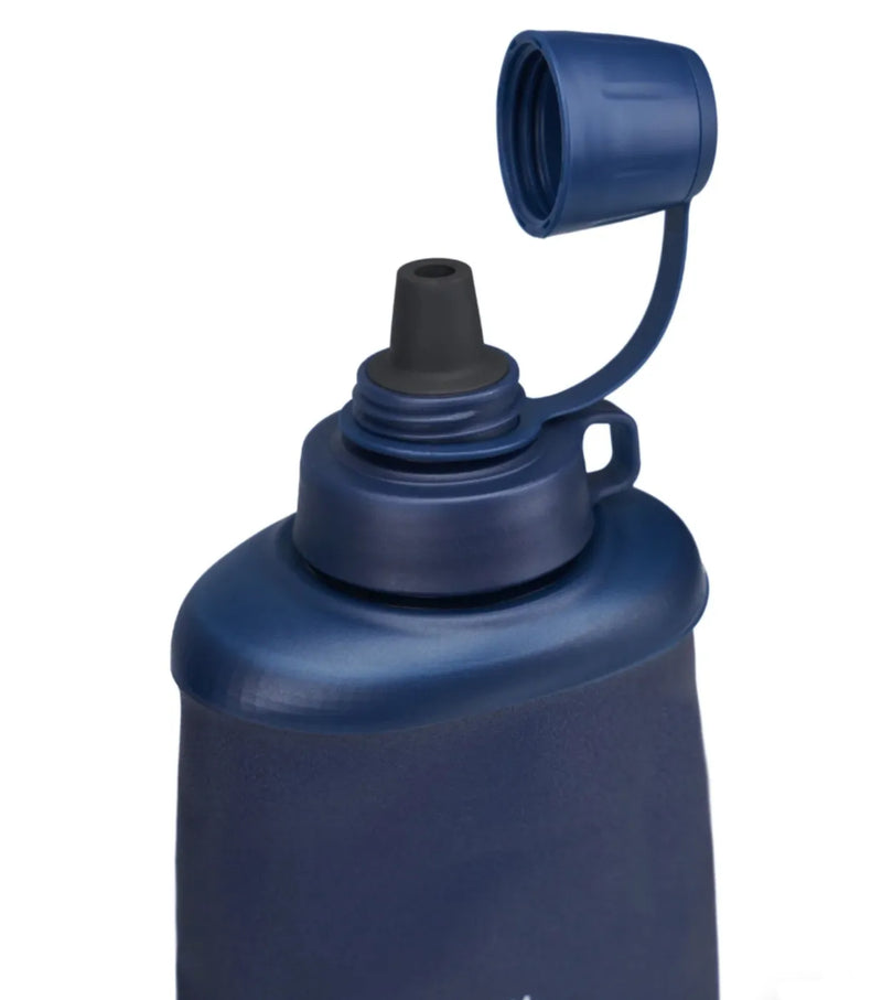 Collapsible squeeze bottle with screw-top cap and tether