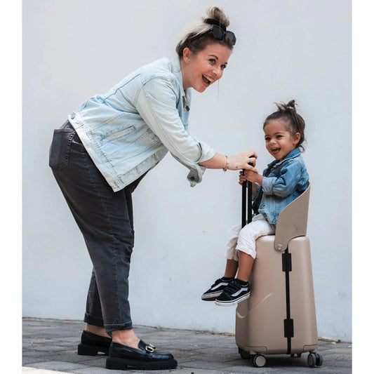 the MiaMily luggage bag universally configures into a ride on suitcase for children