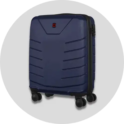 Navy blue hard-shell suitcase with black zippers and wheels, featuring a red logo on the front.