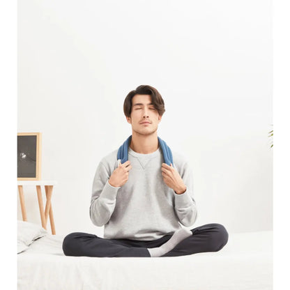 Heated Neck Wrap provides gentle pressure and calming warmth to ease stressed shoulders and nurture your neck