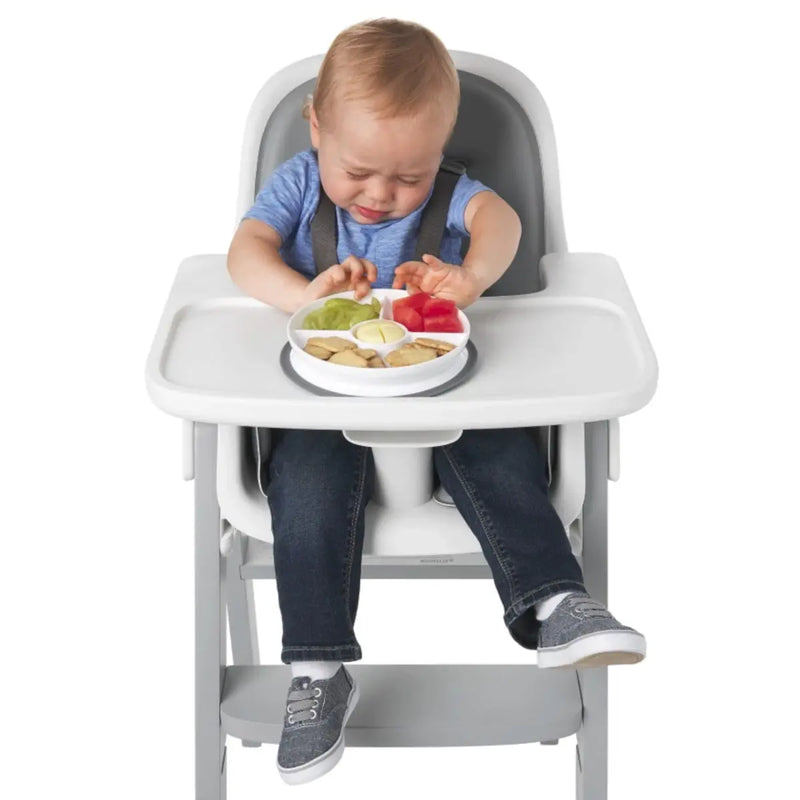 Suctions directly to the table, making it nearly impossible for small hands to remove